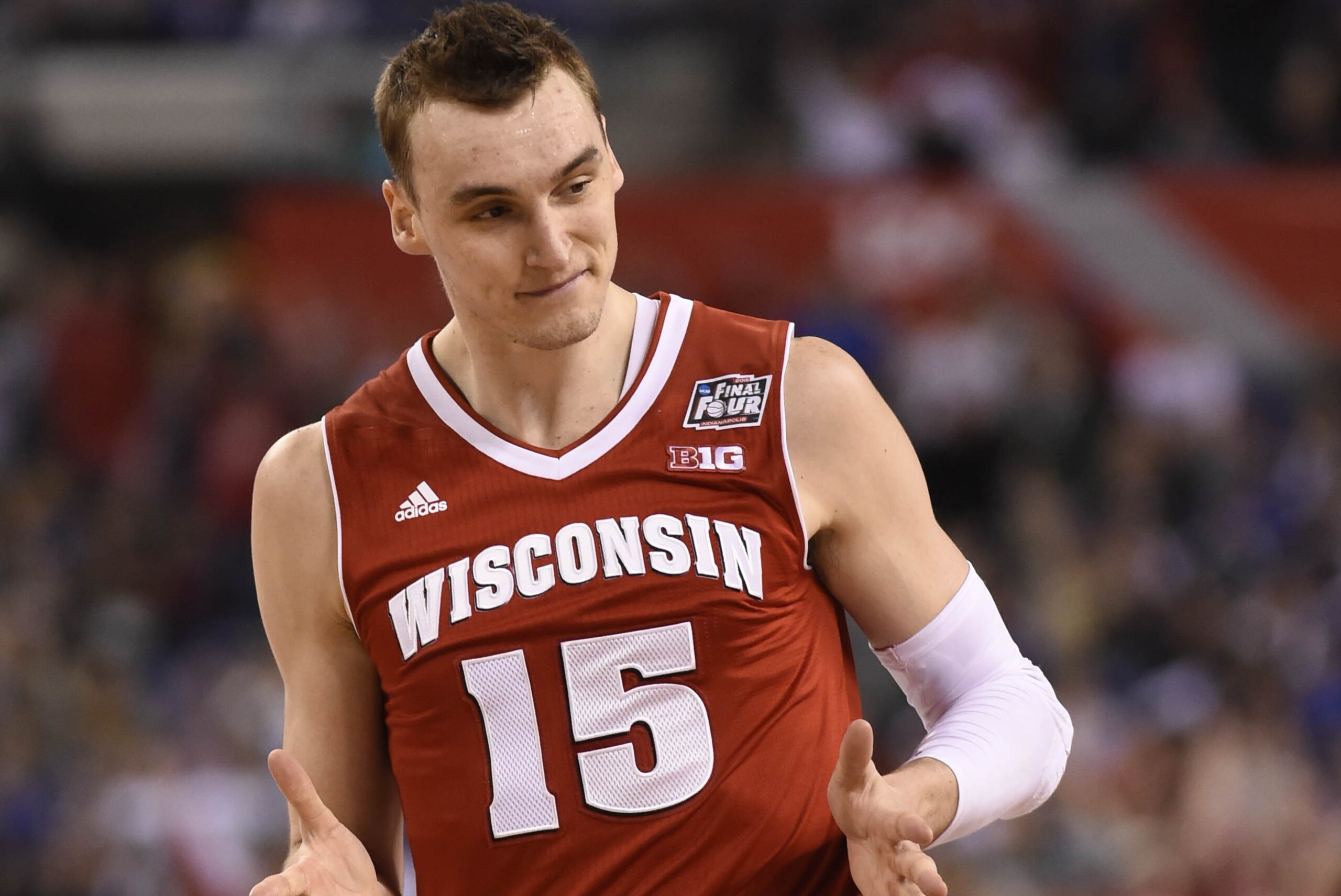 Apr 4, 2015; Indianapolis, IN, USA; Wisconsin Badgers forward Sam Dekker (15) reacts after hitting a three point shot  against the Kentucky Wildcats in the second half of the 2015 NCAA Men's Division I Championship semi-final game at Lucas Oil Stadium. Mandatory Credit: Robert Deutsch-USA TODAY Sports