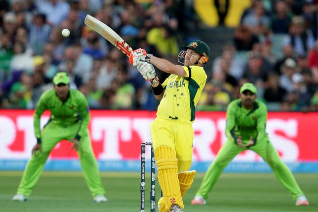 Australia's David Warner hits the ball while batting against Pakistan during their Cricket World Cup quarterfinal match in Adelaide, Australia, Friday, March 20, 2015.(AP Photo/Rob Griffith)