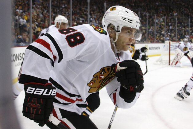 Chicago Blackhawks' Patrick Kane (88) skates during the second period of an NHL hockey game against the Pittsburgh Penguins in Pittsburgh Wednesday, Jan. 21, 2015.(AP Photo/Gene J. Puskar)
