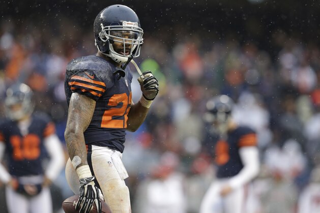 Chicago Bears running back Matt Forte (22) walks off after scoring a touchdown during the second half of an NFL football game against the Tampa Bay Buccaneers Sunday, Nov. 23, 2014, in Chicago. (AP Photo/Nam Y. Huh)