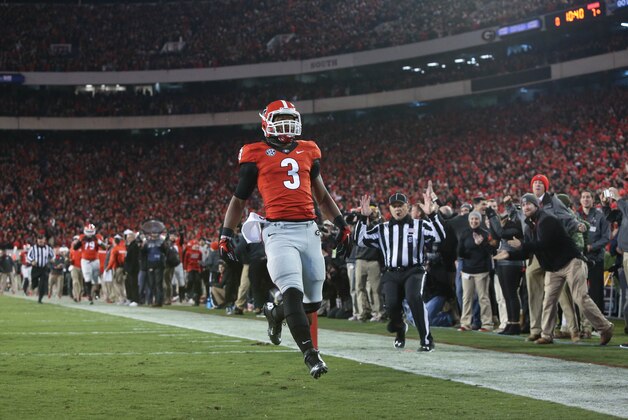 Nov 15, 2014; Athens, GA, USA; Georgia Bulldogs running back Todd Gurley (3) returns a kickoff for a touchdown in the first quarter of their game against the Auburn Tigers at Sanford Stadium. The touchdown was called back due to a holding penalty. Georgia won 34-7. Mandatory Credit: Jason Getz-USA TODAY Sports