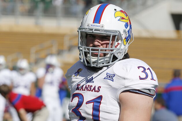 Kansas linebacker Ben Heeney (31) looks around before a  NCAA college football game against Baylor, Saturday, Nov. 1, 2014, in Waco, Texas. (AP Photo/ Jerry Larson)