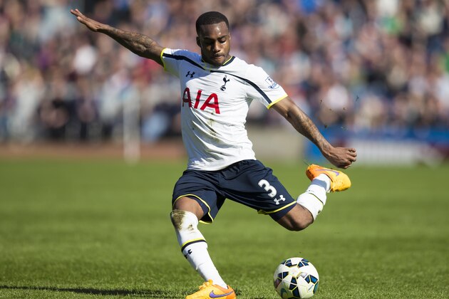 Tottenham's Danny Rose takes a shot during the English Premier League soccer match between Burnley and Tottenham at Turf Moor Stadium, Burnley, England, Sunday April 5, 2015. (AP Photo/Jon Super)