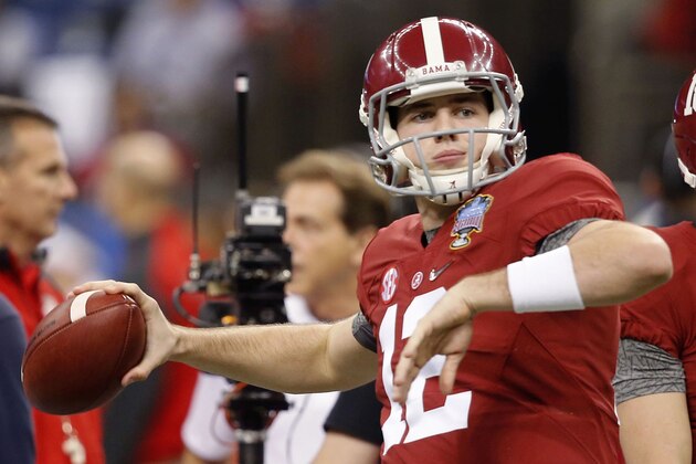 Alabama quarterback David Cornwell (12) warms up before the Sugar Bowl NCAA college football playoff semifinal game against Ohio State, Thursday, Jan. 1, 2015, in New Orleans. (AP Photo/Bill Haber)