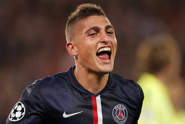 PSG's Marco Verratti celebrates after scoring his side's second goal during the Champions League soccer match between PSG and Barcelona, at the Parc des Princes stadium, in Paris, Tuesday, Sept. 30, 2014. (AP Photo/Christophe Ena)