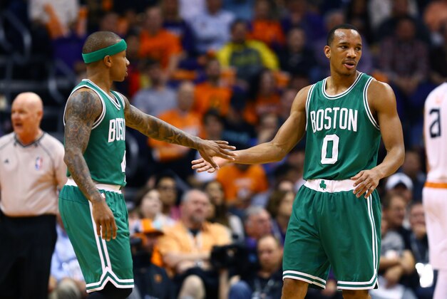 Feb 23, 2015; Phoenix, AZ, USA; Boston Celtics guard Isaiah Thomas (4) and guard Avery Bradley (0) against the Phoenix Suns at US Airways Center. The Celtics defeats the Suns 115-110. Mandatory Credit: Mark J. Rebilas-USA TODAY Sports