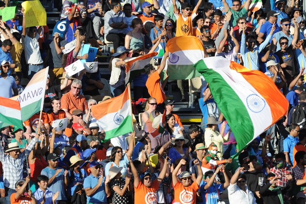 Indian fans cheer their team on during their Cricket World Cup Pool B match against Ireland in Hamilton, New Zealand, Tuesday, March 10, 2015. (AP Photo/Ross Setford) Indian fans cheer their team on during their Cricket World Cup Pool B match against Ireland in Hamilton, New Zealand, Tuesday, March 10, 2015. (AP Photo/Ross Setford)