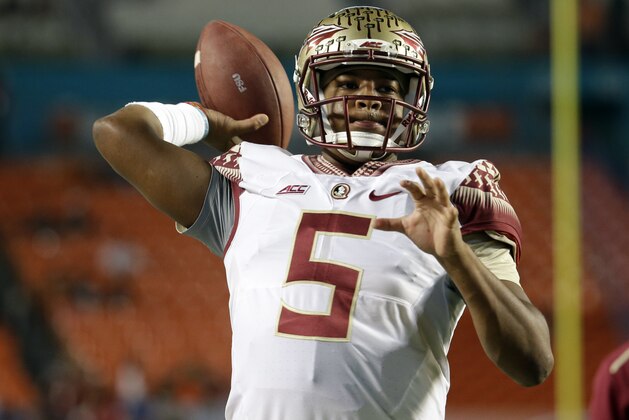 Florida State quarterback Jameis Winston warms up before an NCAA football game against Miami, Saturday, Nov. 15, 2014, in Miami Gardens, Fla. (AP Photo/Lynne Sladky)