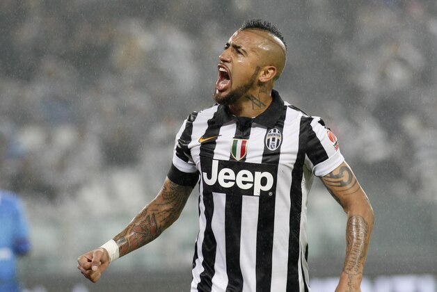 Juventus' Arturo Vidal celebrates after scoring during a Serie A soccer match between Juventus and Torino at the Juventus stadium in Turin, Italy, Sunday, Nov. 30, 2014. (AP Photo/Massimo Pinca) Juventus' Arturo Vidal celebrates after scoring during a Serie A soccer match between Juventus and Torino at the Juventus stadium in Turin, Italy, Sunday, Nov. 30, 2014. (AP Photo/Massimo Pinca)
