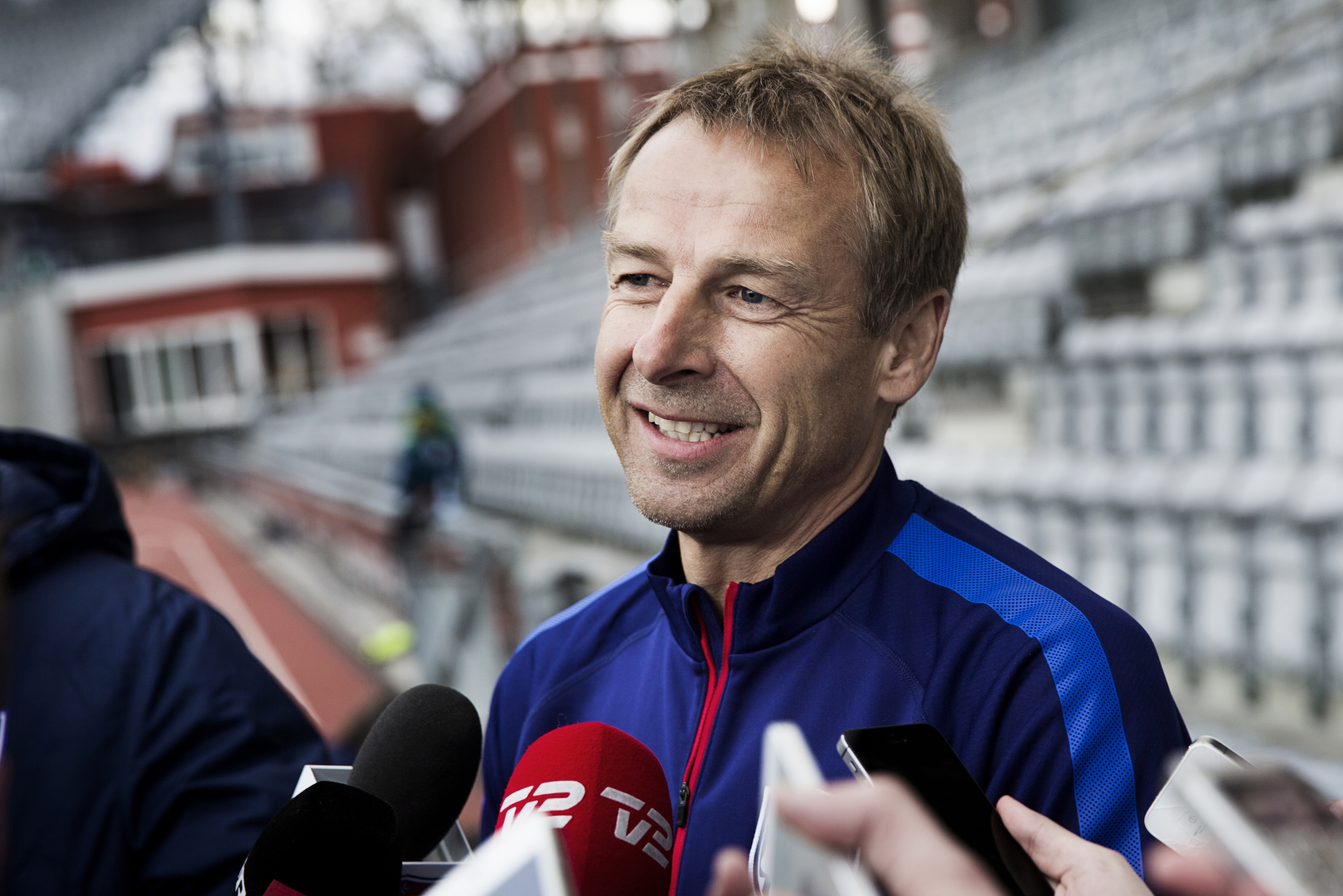 Jurgen Klinsmann, the head coach of the USA national soccer team talks to the media, at NRGI Park stadium in Aarhus, Copenhagen,  Tuesday, March 24, 2015. The team will face Denmark in a friendly international soccer match Wednesday. (AP Photo/ Polfoto, Gregers Tycho)  DENMARK OUT