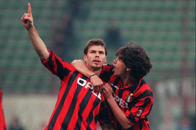 A.C.Milan's Croat midfielder, Zvonimir Boban, left, jubilate after scoring as his teammate Demetrio Albertini shouts, during their Group D, Champions League match against Goteborg, at the Milan San Siro stadium, Wednesday, October 30, 1996.(AP Photo/Carlo Fumagalli)