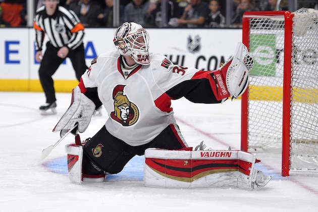 Ottawa Senators goalie Andrew Hammond makes a glove save during the second period of an NHL hockey game against the Los Angeles Kings, Thursday, Feb. 26, 2015, in Los Angeles. (AP Photo/Mark J. Terrill)