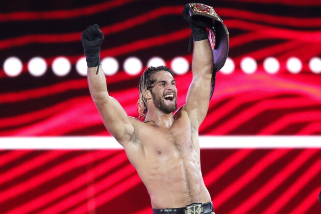 WWE Superstar Seth Rollins celebrates becoming the new WWE World Heavyweight Champion at WrestleMania 31 at Levi's Stadium on Sunday, March 29, 2015 in Santa Clara, CA. WrestleMania broke the Levi’s Stadium attendance record at 76,976 fans from all 50 states and 40 countries. (Don Feria/AP Images for WWE)
