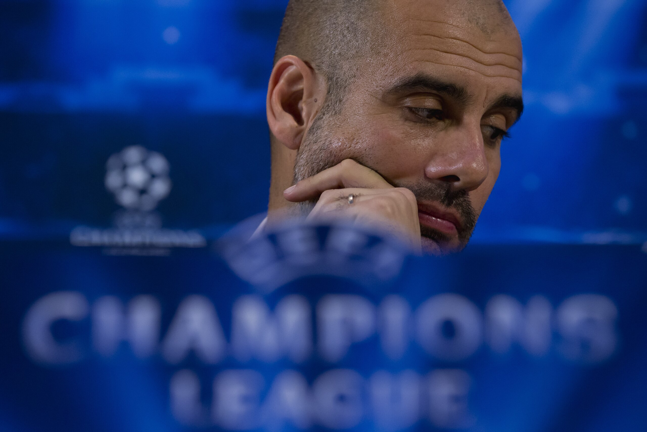 Bayern's head coach Pep Guardiola waits to speak at a press conference in Manchester, England, Monday, Nov. 24, 2014.  Bayern Munich will play Manchester City on Tuesday in a Champions League Group E soccer match. (AP Photo/Jon Super)