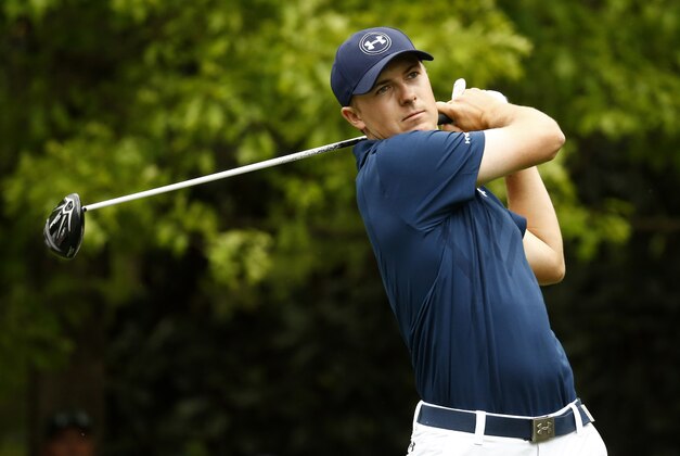 Apr 12, 2015; Augusta, GA, USA; Jordan Spieth hits his tee shot on the 7th hole during the final round of The Masters golf tournament at Augusta National Golf Club. Mandatory Credit: Rob Schumacher-USA TODAY Sports