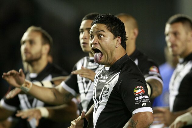 New Zealand's Isaac Luke, center, performs the haka with teammates before their four nations rugby league test match against Australia at the Halliwell Jones Stadium, Warrington, England, Friday Oct. 28, 2011. (AP Photo/Tim Hales)
