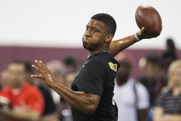 Jameis Winston passes during Florida State football pro day in Tallahassee, Fla., Tuesday, March 31, 2015.  (AP Photo/Mark Wallheiser)
