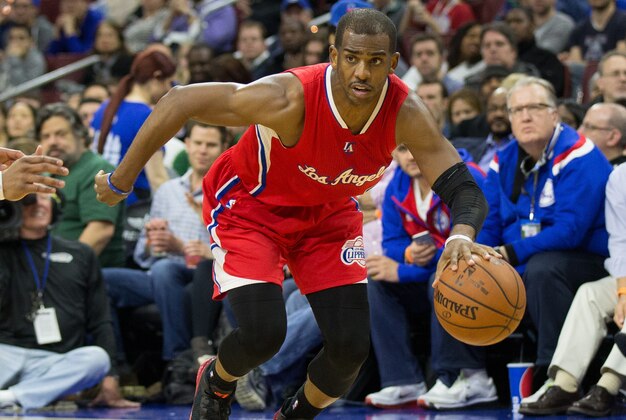 Mar 27, 2015; Philadelphia, PA, USA; Los Angeles Clippers guard Chris Paul (3) dribbles against the Philadelphia 76ers during the second half at Wells Fargo Center. The Clippers won 119-98. Mandatory Credit: Bill Streicher-USA TODAY Sports