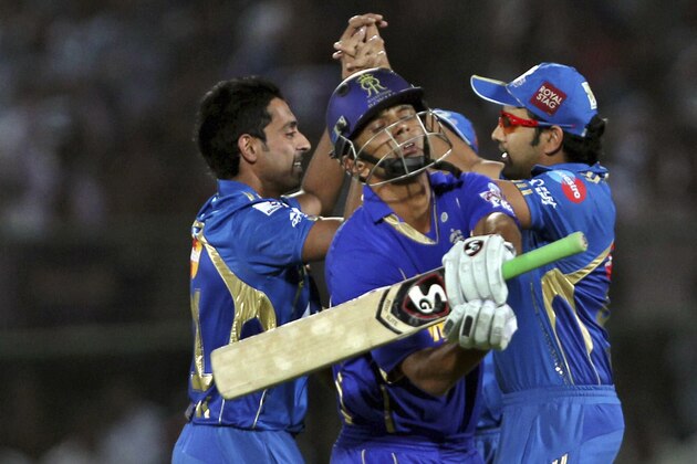 Rajasthan Royals captain Rahul Dravid, center, reacts after his dismissal during during their Indian Premier League (IPL) cricket match against Mumbai Indians in Jaipur, India, Sunday, May 20, 2012.(AP Photo)