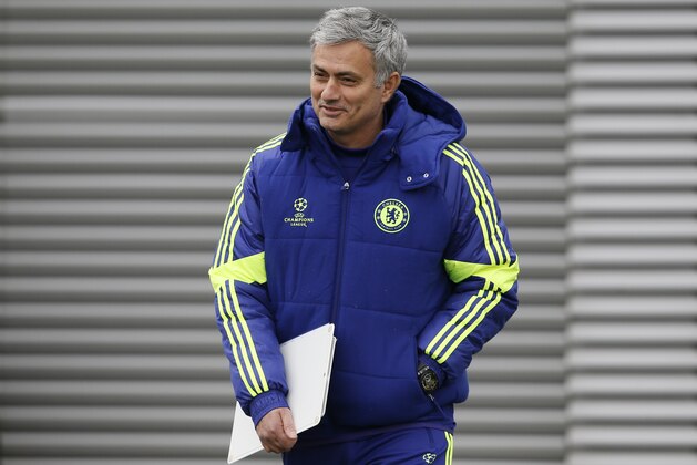 Chelsea's manager Jose Mourinho smiles as he arrives for a training session at the training ground in Cobham, England, Monday, Feb. 16, 2014. Chelsea will play Paris Saint Germain in a Champions League knock out round of sixteen in Paris on Tuesday. (AP Photo/Kirsty Wigglesworth)