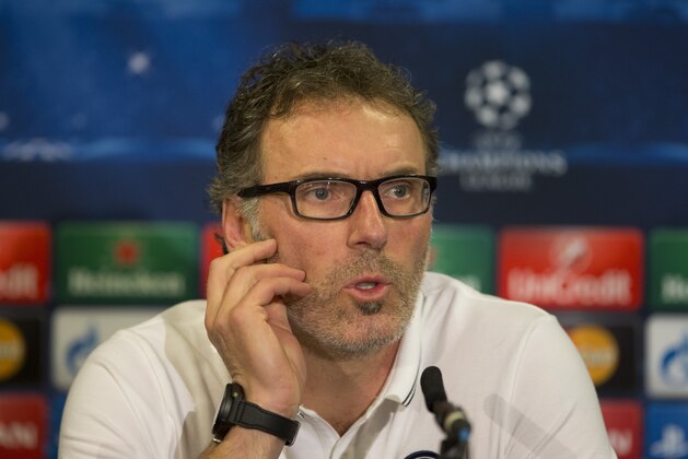 Paris Saint-Germain's head coach Laurent Robert Blanc speaks during a press conference ahead of their Champions League round of 16 second leg soccer match against Chelsea at Stamford Bridge stadium in London, Tuesday, March 10, 2015.  The teams go into the match at the stadium on Wednesday with a first-leg score of 1-1.  (AP Photo/Matt Dunham)