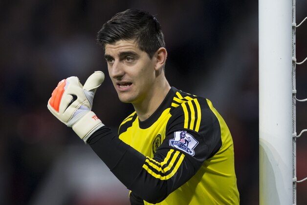 Chelsea's goalkeeper Thibaut Courtois is seen during his team's English Premier League soccer match between Manchester United and Chelsea at Old Trafford Stadium, Manchester, England, Sunday Oct. 26, 2014. (AP Photo/Jon Super)