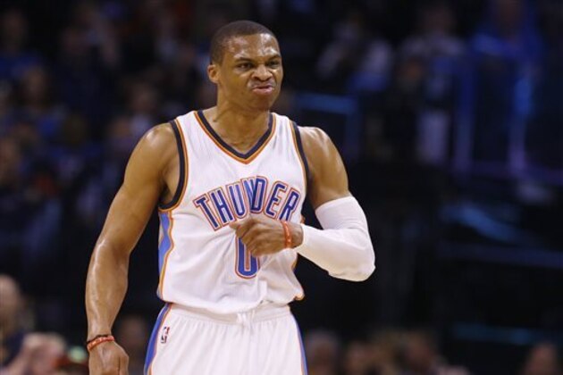 Oklahoma City Thunder guard Russell Westbrook reacts after hitting a 3-point shot during the first quarter of an NBA basketball game against the Portland Trail Blazers in Oklahoma City, Monday, April 13, 2015. (AP Photo/Sue Ogrocki)