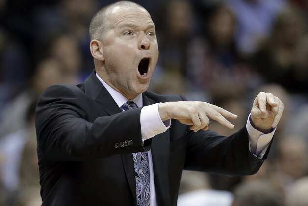 Sacramento Kings head coach Michael Malone argues a call in the second half of an NBA basketball game against the Memphis Grizzlies, Thursday, Nov. 13, 2014, in Memphis, Tenn. The Grizzlies won 111-110. (AP Photo/Mark Humphrey)