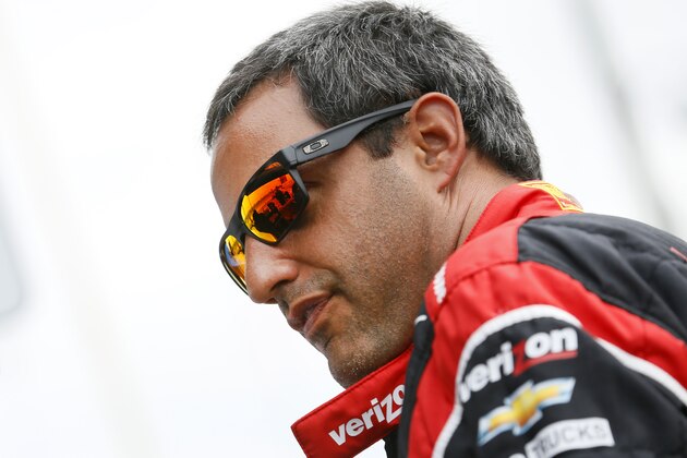 Juan Pablo Montoya, of Colombia, is seen before a practice round for the IndyCar Grand Prix of Louisiana auto race, Saturday, April 11, 2015, in Avondale, La. (AP Photo/Jonathan Bachman)