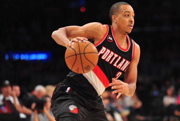 April 3, 2015; Los Angeles, CA, USA; Portland Trail Blazers guard C.J. McCollum (3) moves the ball against the Los Angeles Lakers during the first half at Staples Center. Mandatory Credit: Gary A. Vasquez-USA TODAY Sports