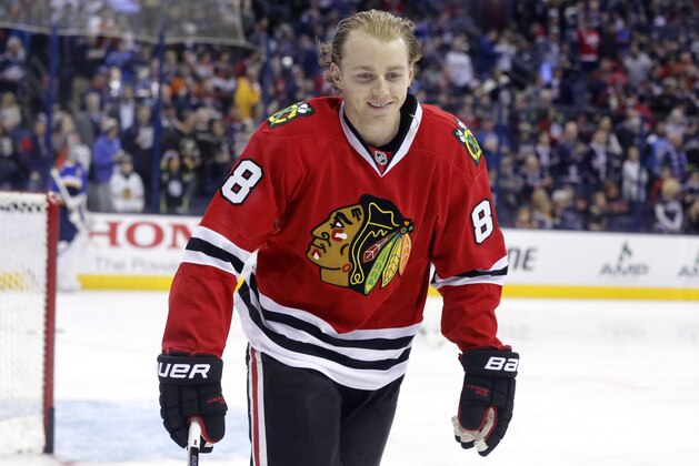 Chicago Blackhawks' Patrick Kane (88) warms up before the NHL All-Star hockey skills competition in Columbus, Ohio, Saturday, Jan. 24, 2015. (AP Photo/Gene J. Puskar)