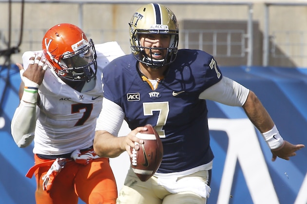 Pittsburgh quarterback Tom Savage (7) runs away from Virginia defensive end Eli Harold (7) in the third quarter of an NCAA football game Saturday, Sept. 28, 2013 in Pittsburgh. Pittsburgh won 14-3. (AP Photo/Keith Srakocic)