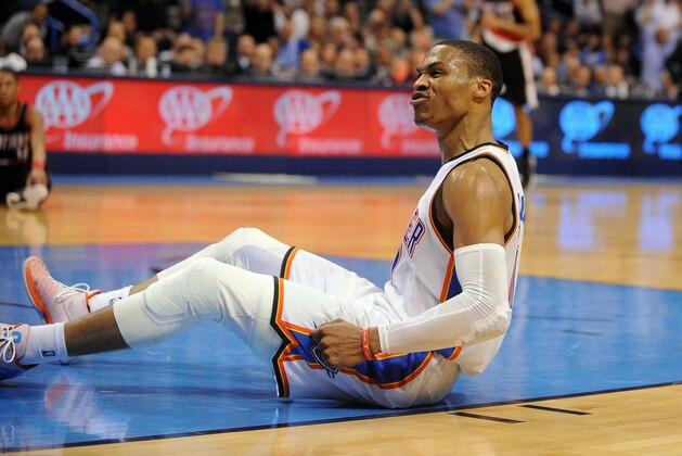 Apr 13, 2015; Oklahoma City, OK, USA; Oklahoma City Thunder guard Russell Westbrook (0) reacts after being fouled on a shot attempt in action against the Portland Trail Blazers during the fourth quarter at Chesapeake Energy Arena. Mandatory Credit: Mark D. Smith-USA TODAY Sports