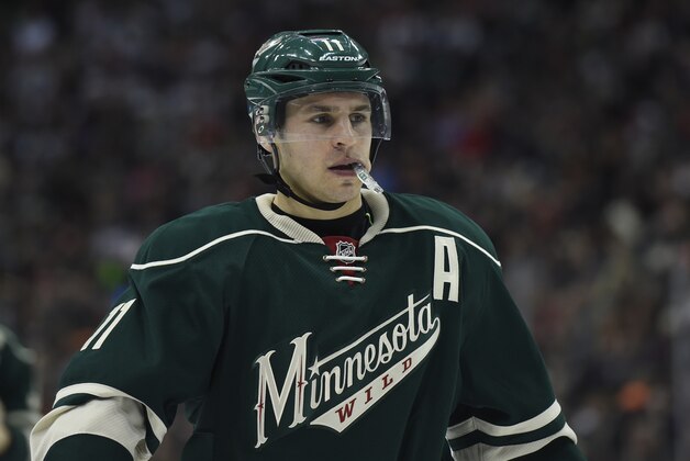 Minnesota Wild left wing Zach Parise (11) watches during a break in the second period of an NHL hockey game against the Arizona Coyotes Saturday, Jan. 17, 2015, in St. Paul, Minn. The Wild won 3-1. (AP Photo/Hannah Foslien)