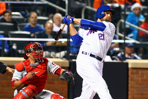 Apr 14, 2015; New York City, NY, USA; New York Mets first baseman Lucas Duda (21) hits a three run double in the second inning against the Philadelphia Phillies at Citi Field. Mandatory Credit: Andy Marlin-USA TODAY Sports