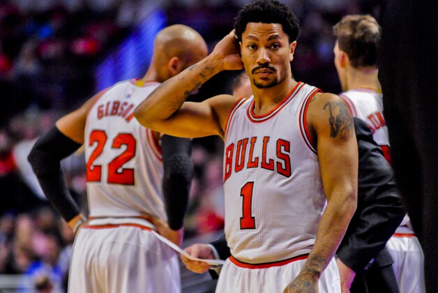 Chicago Bulls guard Derrick Rose (1) against the Philadelphia 76ers during an NBA basketball game Saturday, April 11, 2015, in Chicago. (AP Photo/Matt Marton)