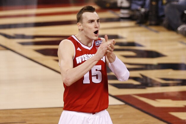 Apr 4, 2015; Indianapolis, IN, USA; Wisconsin Badgers forward Sam Dekker (15) reacts at the end of the 2015 NCAA Men's Division I Championship semi-final game against the Kentucky Wildcats at Lucas Oil Stadium. Wisconsin won 71-64. Mandatory Credit: Brian Spurlock-USA TODAY Sports