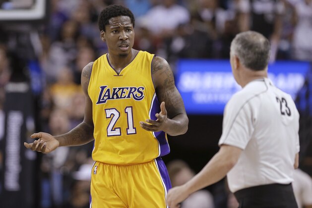 Los Angeles Lakers guard Jabari Brown questions official Jason Phillips about a foul call during the second half of an NBA basketball game against the Sacramento Kings in Sacramento, Calif., Monday, April 13, 2015. The Kings won 102-92. (AP Photo/Rich Pedroncelli)