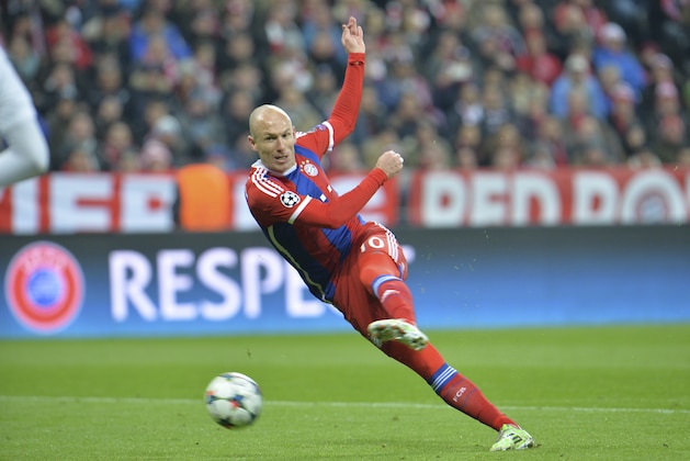 Bayern's Arjen Robben kicks a ball during the Champions League round of 16 second leg soccer match between Bayern Munich and Shakhtar Donetsk Wednesday, March 11, 2015 in Munich, southern Germany. (AP Photo/Kerstin Joensson)