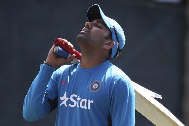 India's Rohit Sharma prepares to bat in the nets during training for their Cricket World Cup semifinal match in Sydney, Australia, Monday, March 23, 2015. India will play Australia in Sydney, Thursday. (AP Photo/Rick Rycroft)