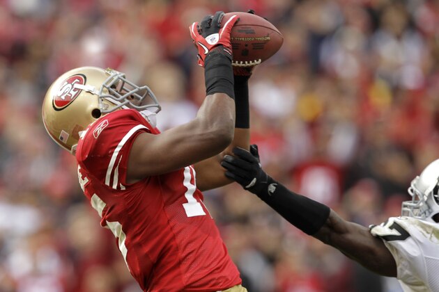 San Francisco 49ers wide receiver Michael Crabtree catches a 32-yard touchdown pass against the Oakland Raiders in the third quarter of an NFL football game in San Francisco, Sunday, Oct. 17, 2010. (AP Photo/Marcio Jose Sanchez)