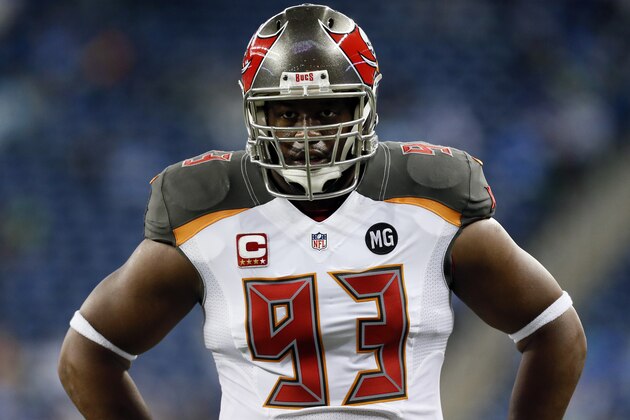 Tampa Bay Buccaneers defensive tackle Gerald McCoy watches during pre-game warmups of an NFL football game against the Detroit Lions in Detroit, Sunday, Dec. 7, 2014. (AP Photo/Paul Sancya)