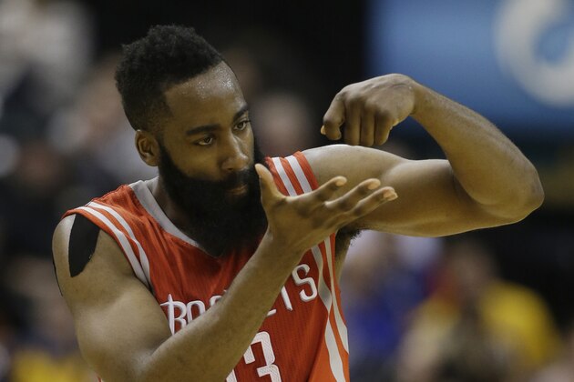 Houston Rockets' James Harden (13) reacts after hitting a basket during the second half of an NBA basketball game against the Indiana Pacers, Monday, March 23, 2015, in Indianapolis. Houston won 110-100. (AP Photo/Darron Cummings)