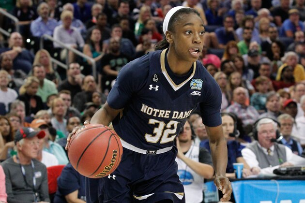 Apr 7, 2015; Tampa, FL, USA; Notre Dame Fighting Irish guard Jewell Loyd (32) drives to the basket against the Connecticut Huskies during the second half of the 2015 NCAA Women's Division I Championship game at Amalie Arena. Mandatory Credit: Kim Klement-USA TODAY Sports