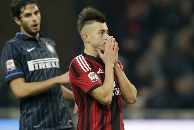 AC Milan's Stephan El Shaarawy reacts after missing a scoring chance during the Serie A soccer match between AC Milan and Inter Milan at the San Siro stadium in Milan, Italy, Sunday, Nov. 23, 2014. (AP Photo/Antonio Calanni)