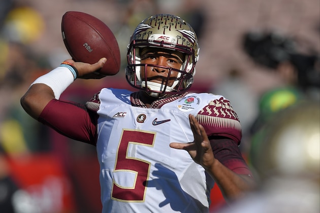 Florida State quarterback Jameis Winston warms up for the Rose Bowl NCAA college football playoff semifinal against Oregon, Thursday, Jan. 1, 2015, in Pasadena, Calif. (AP Photo/Mark J. Terrill)