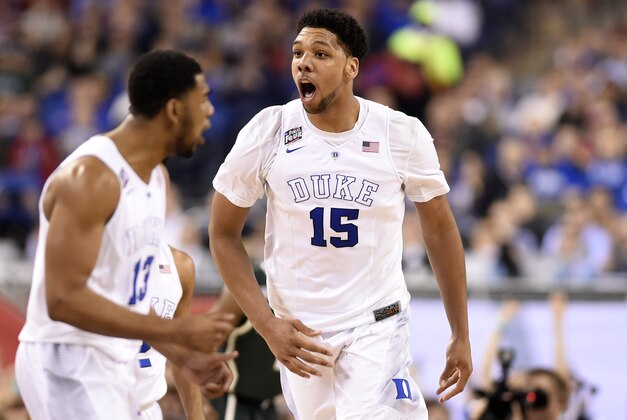 Apr 4, 2015; Indianapolis, IN, USA; Duke Blue Devils center Jahlil Okafor (15) reacts after a dunk against the Michigan State Spartans in the second half of the 2015 NCAA Men's Division I Championship semi-final game at Lucas Oil Stadium. Mandatory Credit: Bob Donnan-USA TODAY Sports