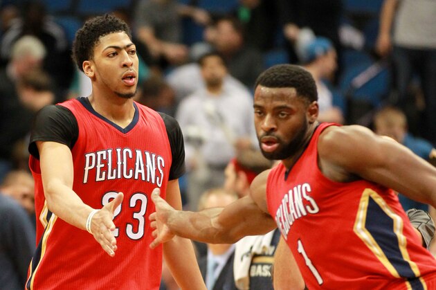 New Orleans Pelicans Tyreke Evans (1) and Anthony Davis congratulate each other after defeating the Minnesota Timberwolves 100-88 during their NBA basketball Monday, April, 13, 2015 in Minneapolis.(AP Photo/Andy Clayton- King)