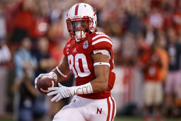 Nebraska wide receiver Kenny Bell (80) scores a touchdown in the first half of an NCAA college football game against Miami in Lincoln, Neb., Saturday, Sept. 20, 2014. (AP Photo/Nati Harnik)