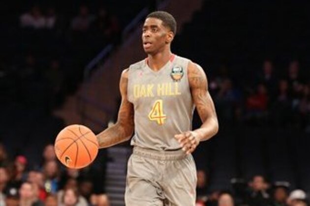 Oak Hill Academy's Dwayne Bacon #4 in action against Montverde Academy in the DICK'S Sporting Goods High School National Basketball Tournament Final at Madison Square Garden on Saturday, April  4, 2015 in New York City.  Montverde won the game 70-61. (AP Photo/Gregory Payan)